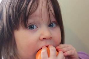 Baking with fresh, juicy peaches is fabulous, but this little girl has found the best way: right out of hand!